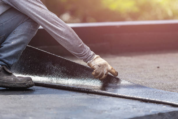 Professional Emergency Waterproofing technician working in Shirley, NY